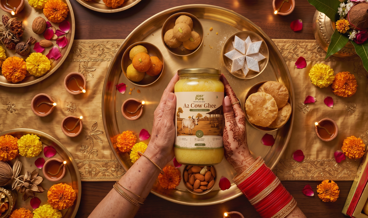 Just Pure A2 Cow Ghee in a festive food setting